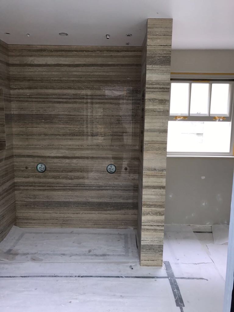 Wood-look tile shower installation